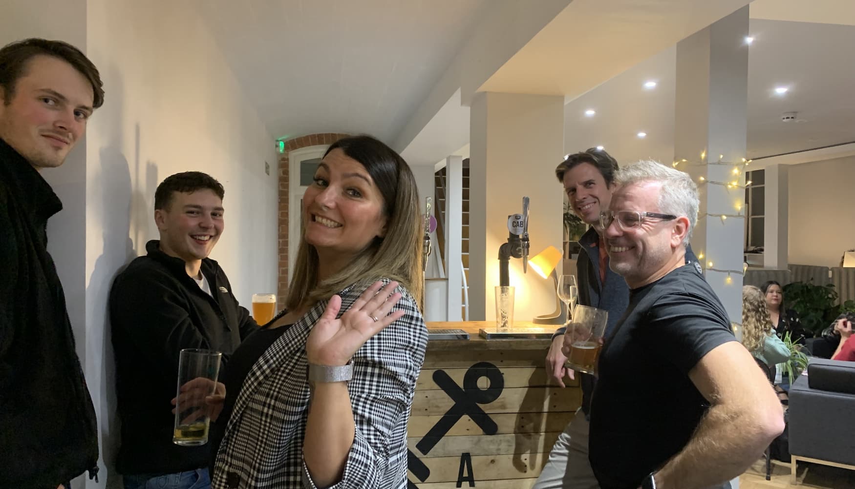 Multiple Propeller Exmouth community members surrounding a Cross Anchor Brewery mobile bar at a Propeller Event